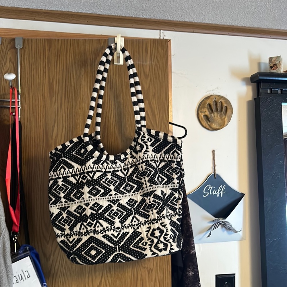 Black and cream colored hobo bag.  Never used.